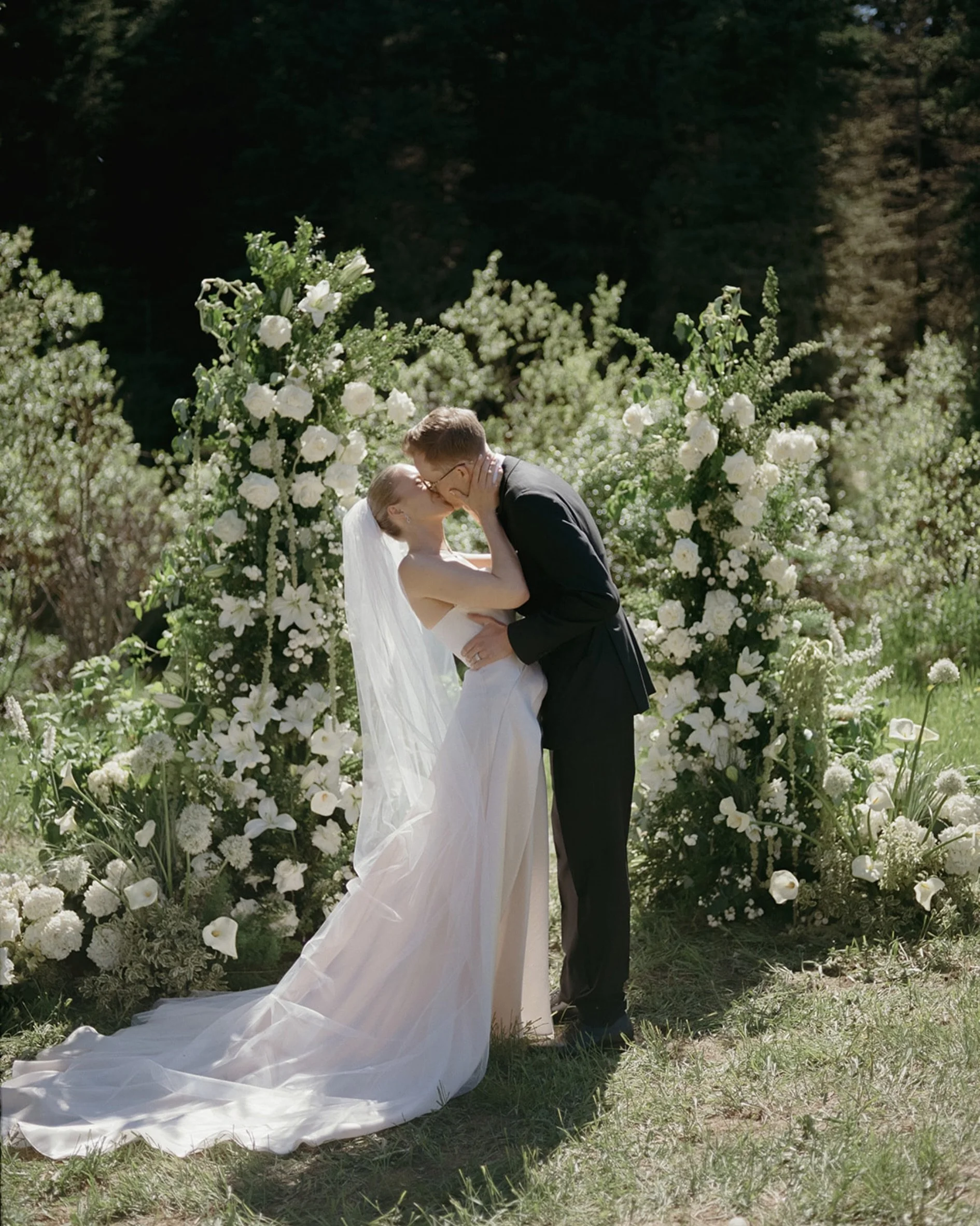 Nike came to us dreaming of a wedding with lush greenery, an elevated garden party, a tented celebration, and a gown with just the right amount of drama.

From her very first appointment, Luna by Katherine Tash was the one everyone kept coming back t