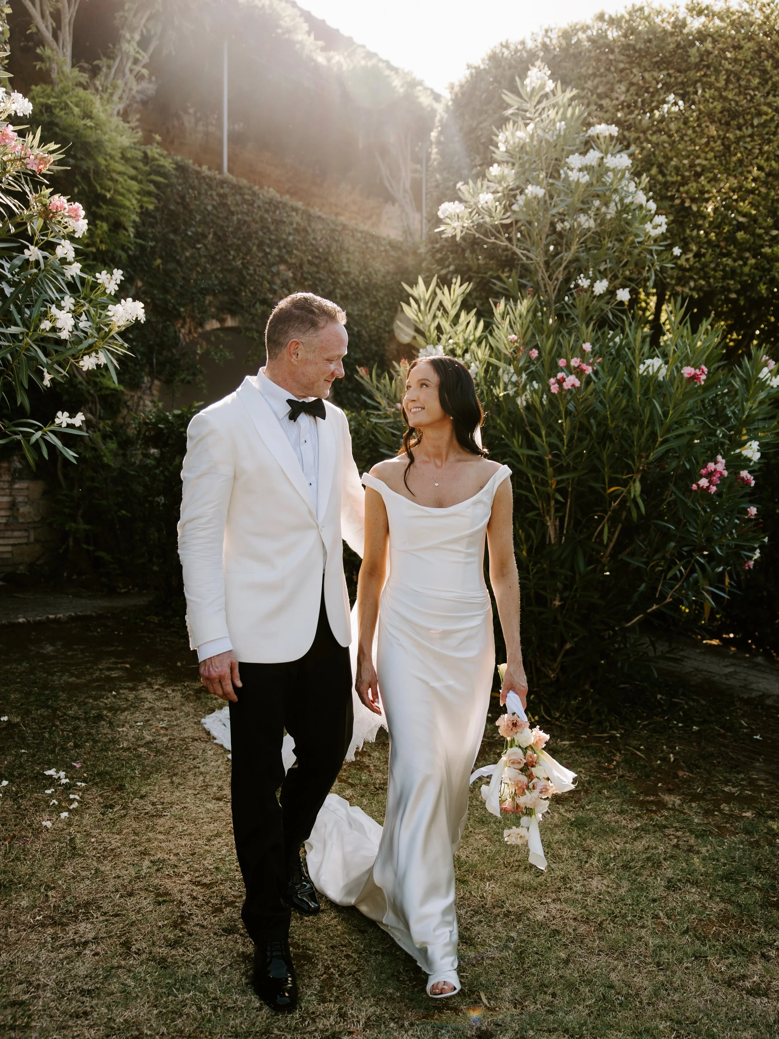 Falling for the timeless elegance of Jacques by @alexandragrecco.

The most beautiful bride, in the most beautiful setting. Congratulations Meredith &amp; Ryan 🤍  Photographed by @kukushkina.photography 🕊️
 #AlexandraGrecco #BlushAndRaven #TuscanyW