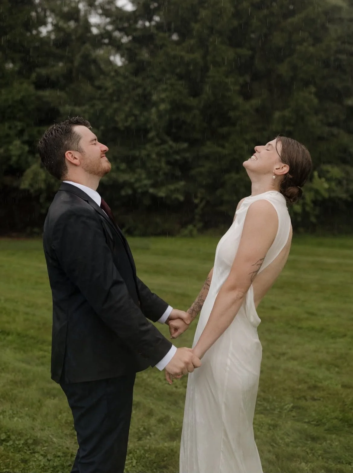 Is there anything more romantic than two people completely in love, tying the knot and embracing the rain?

When we tell you we are simultaneously screaming, crying, smiling and melting over these photos, we mean it. Our bride is an absolute vision i