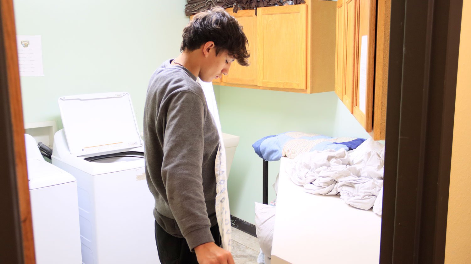   Learning life skills such as doing their own laundry helps prepare young men for independent futures.  