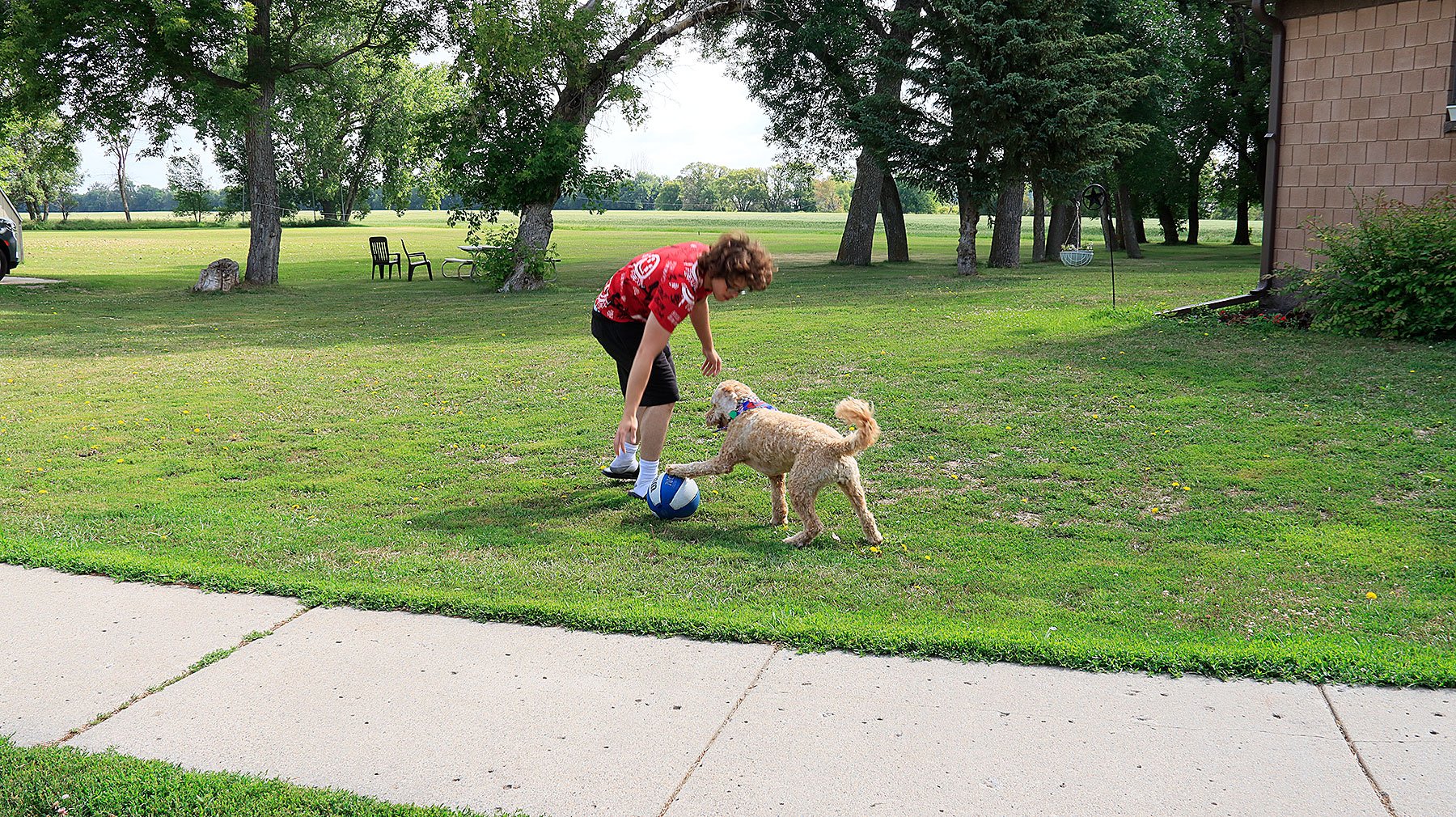   Caring for resident dog River teaches residents responsibility and compassion.  