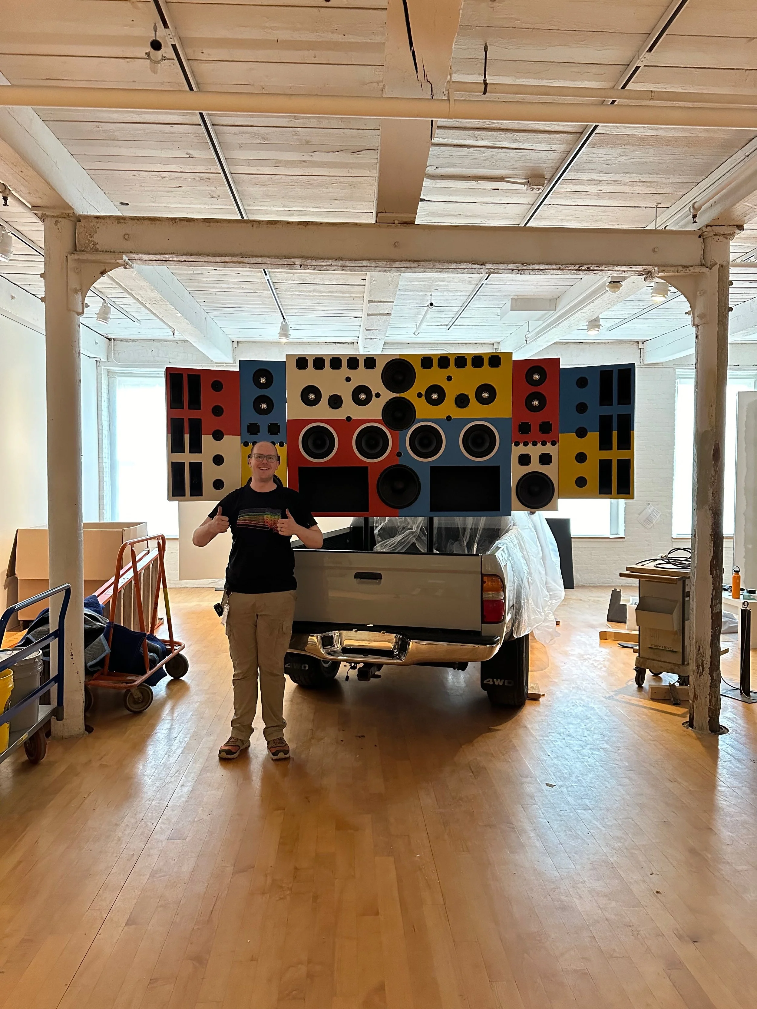 A proud art fabricator (me) standing with his project.