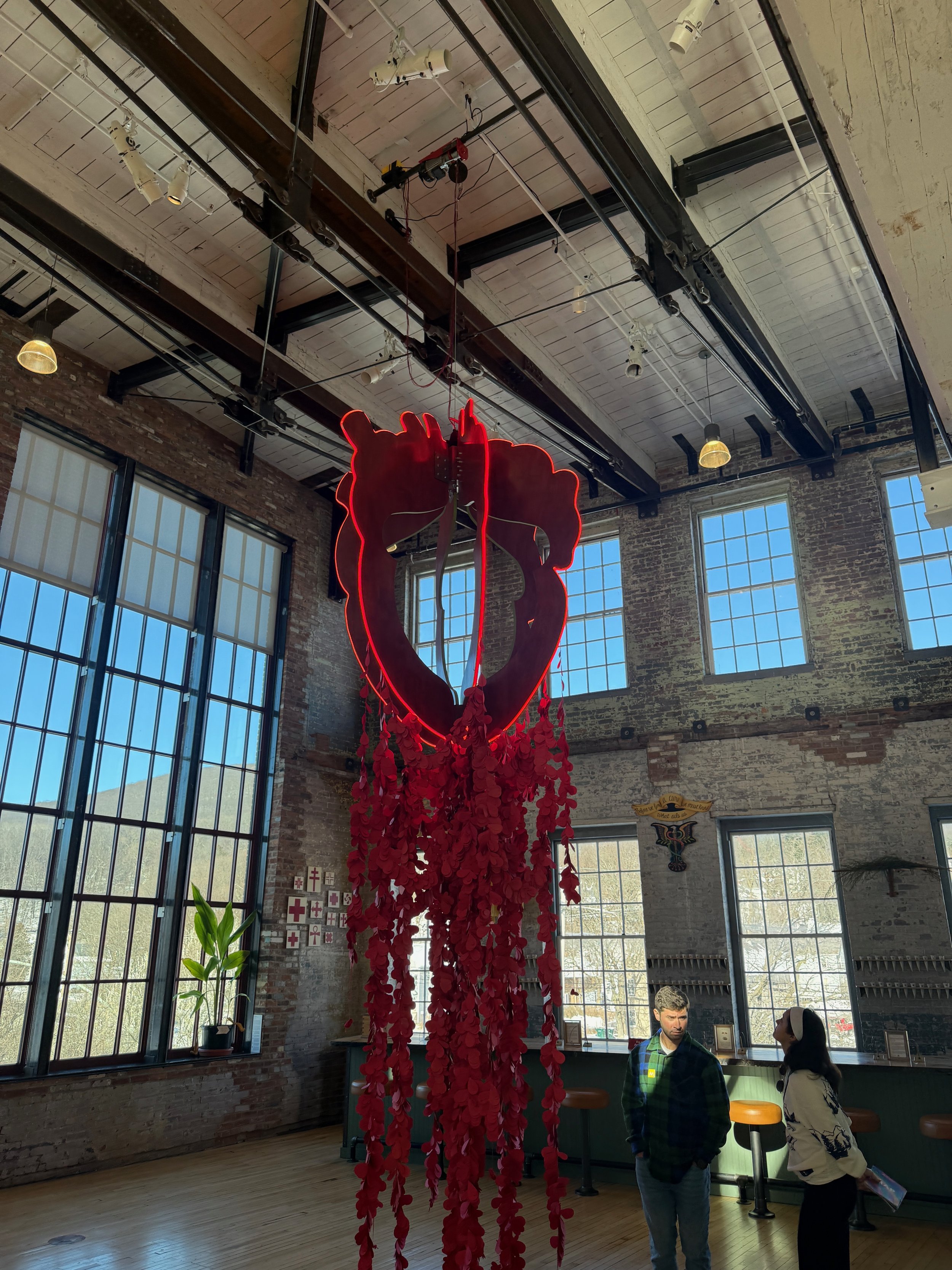 A heart chandelier that I designed and wired for Alison Pebworth's Cultural Apothecary. 

Additional paper hearts inscribed with museumgoers deepest desires were added to the installation weekly by the artist. 