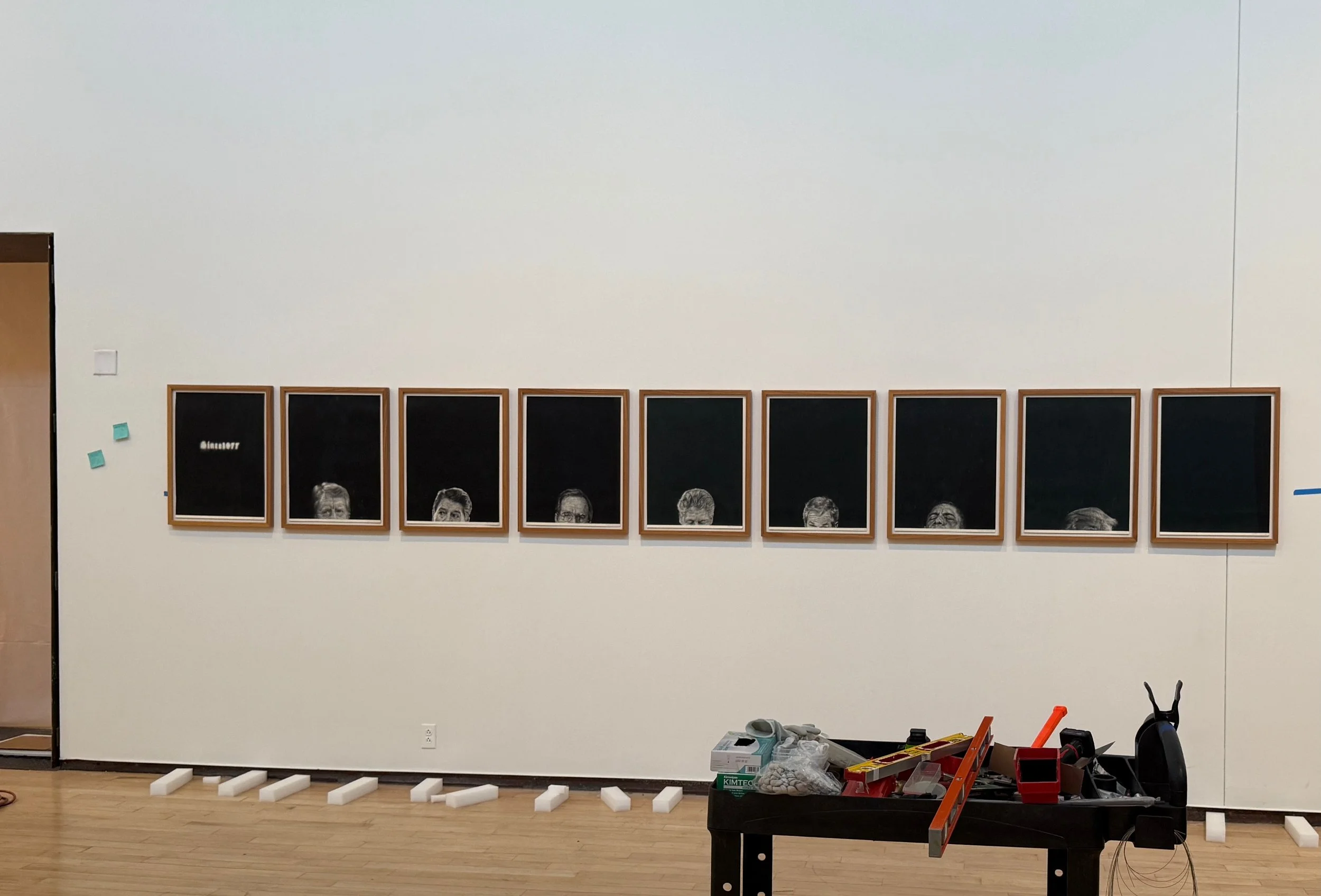 Process photo from the installation of Vincent Valdez' piece Since 1977