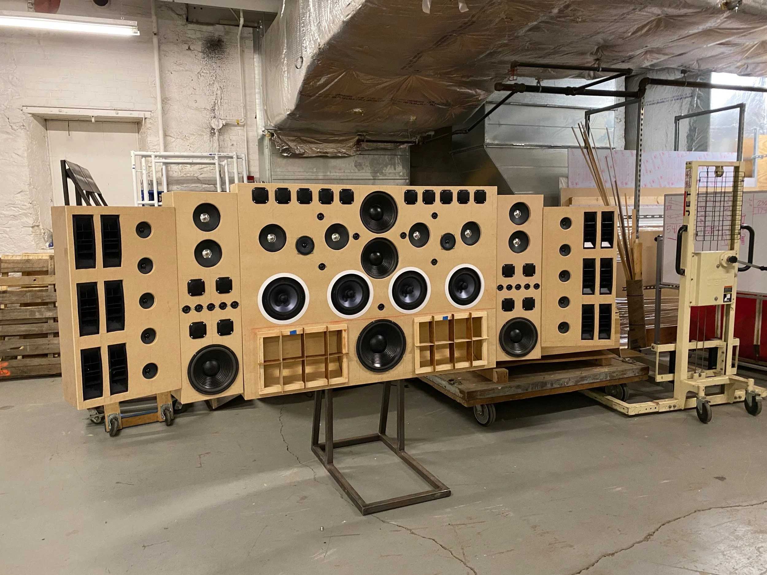 Process photo taken during the first test fit with all of the speakers in place. 