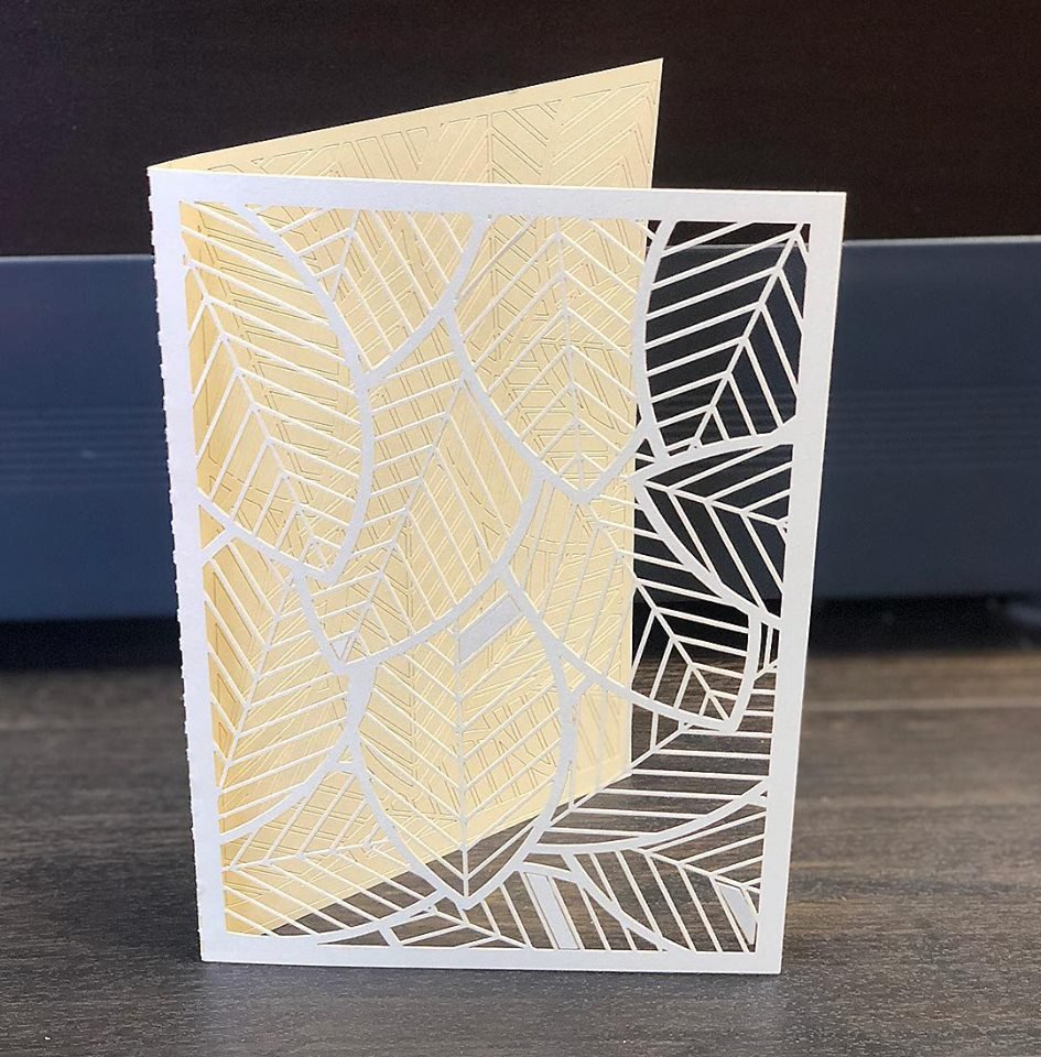 Paper Cut into a Greeting Card with a Laser