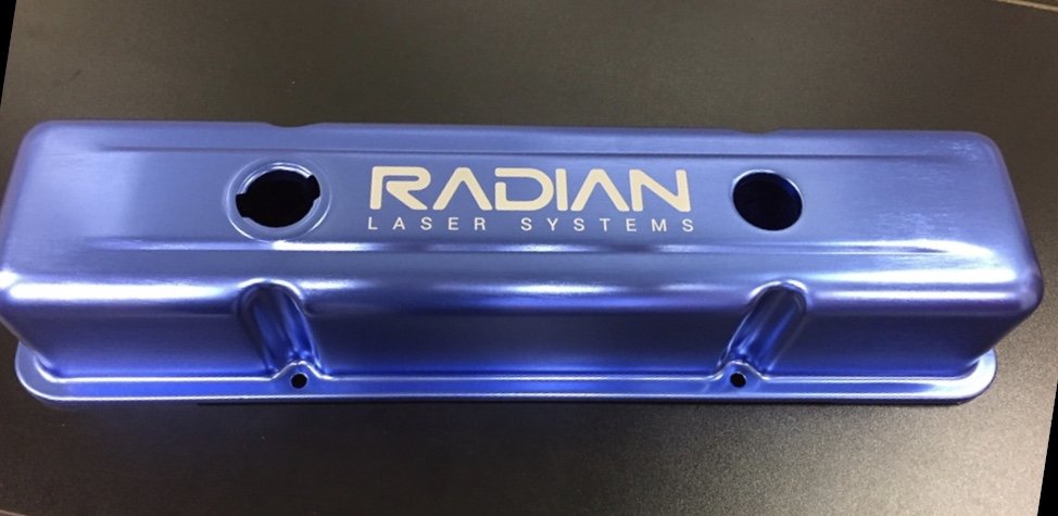 AUTOMOTIVE ACCESSORY MARKED WITH OPEN FRAME FIBER LASER