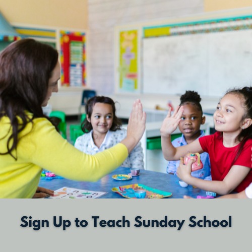 A teacher giving a high-five to three young students in a classroom, with educational posters on the wall. Caption: 'Sign up to teach Sunday school.'