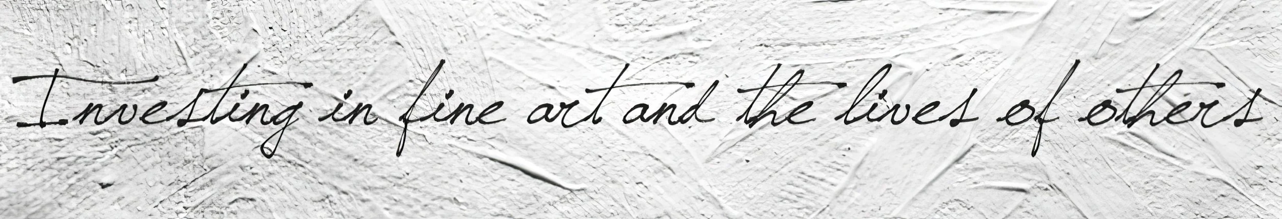 Close-up of a textured white wall with a handwritten quote in black cursive that says, 'Investing in fine art and the lives of others.'