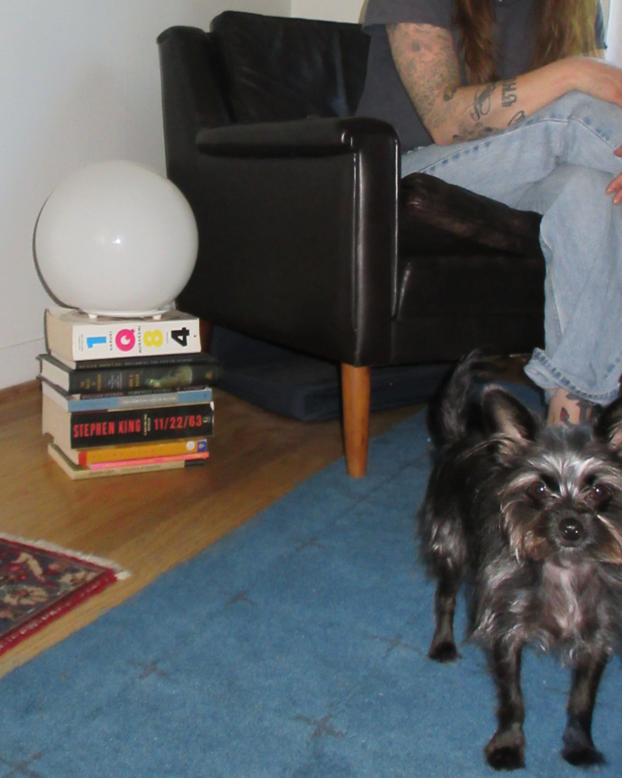 pepper shows off some of the books her mom has read so far this year.