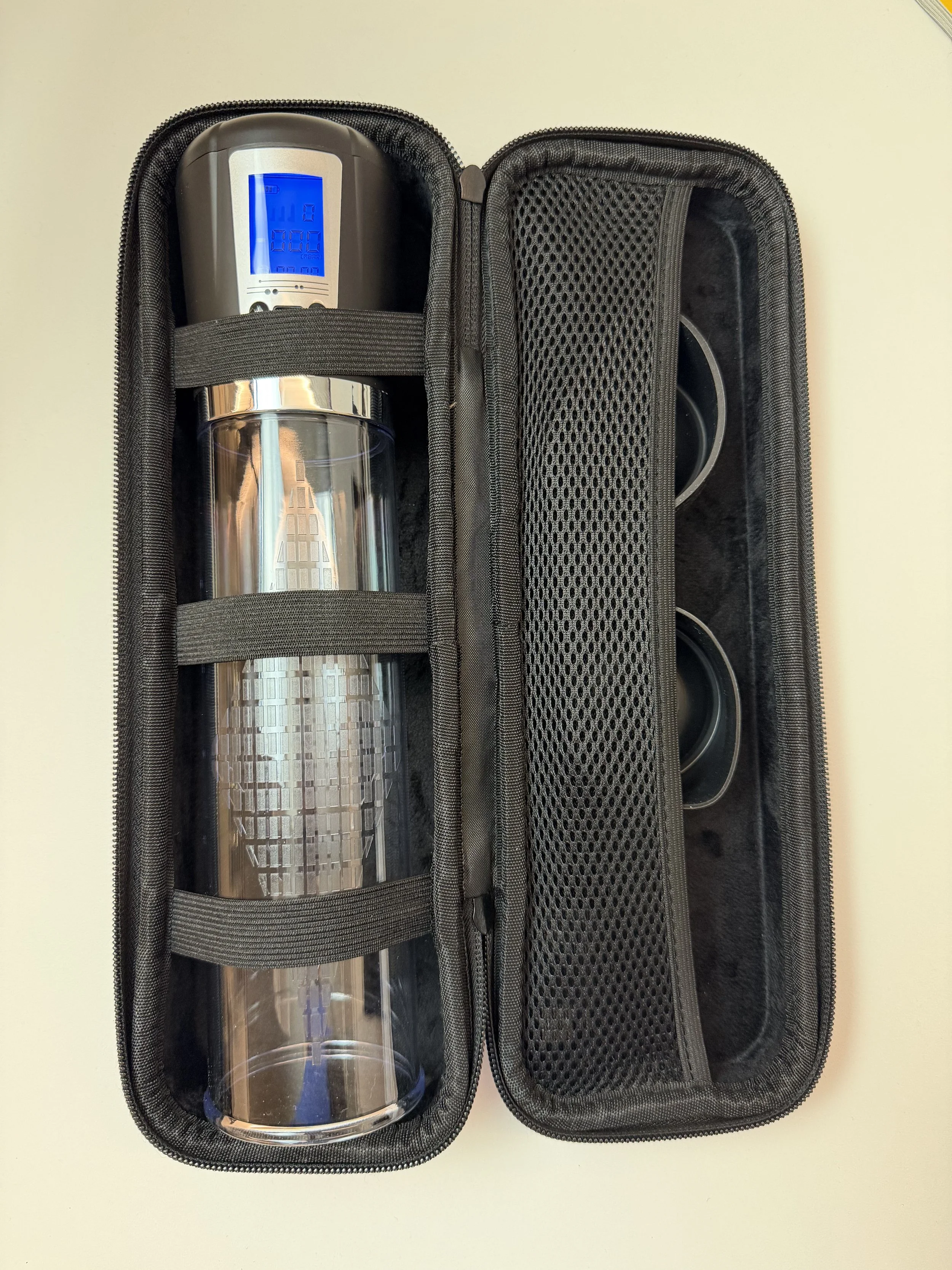 Case open showing secure straps and pocket.jpg