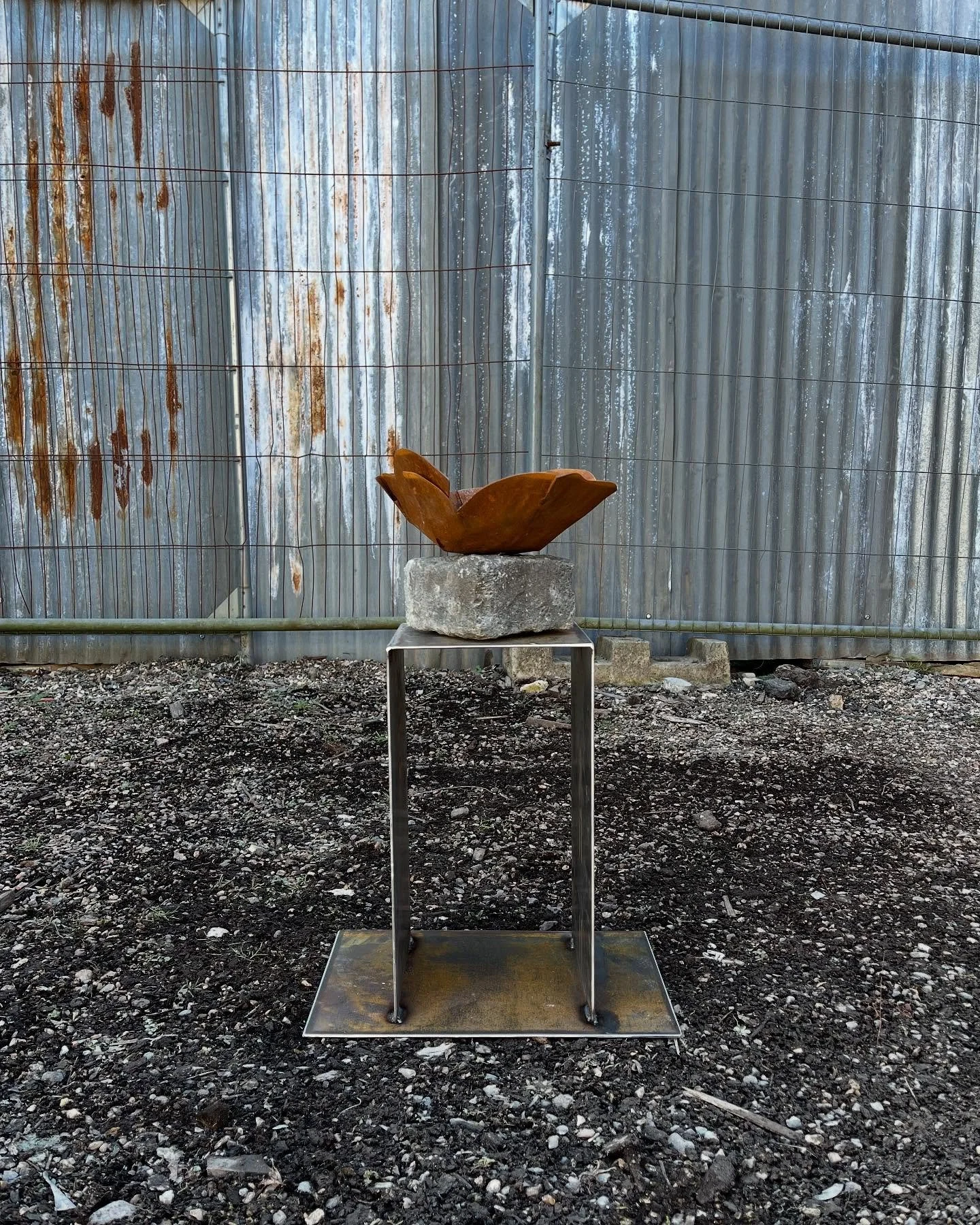 A wee bird bath I made for me Nan. Made from Corten and reclaimed granite