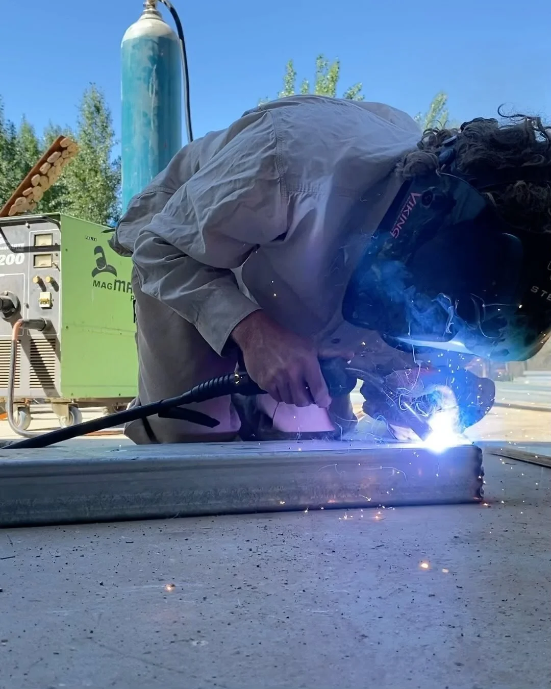 Portal frame fabrication and installation a couple weeks ago along with a rammed Earth bench