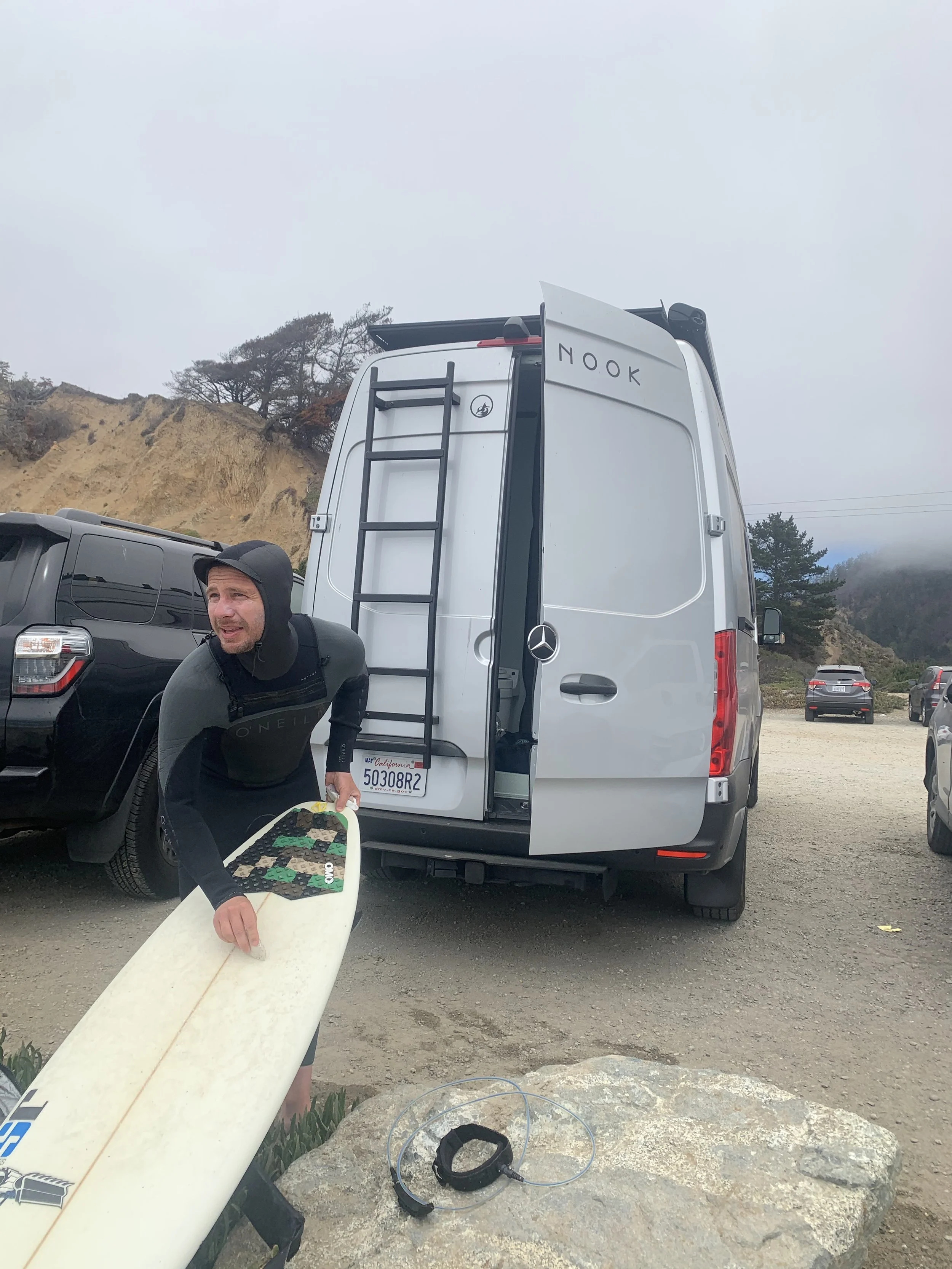 Camper van and a surfer
