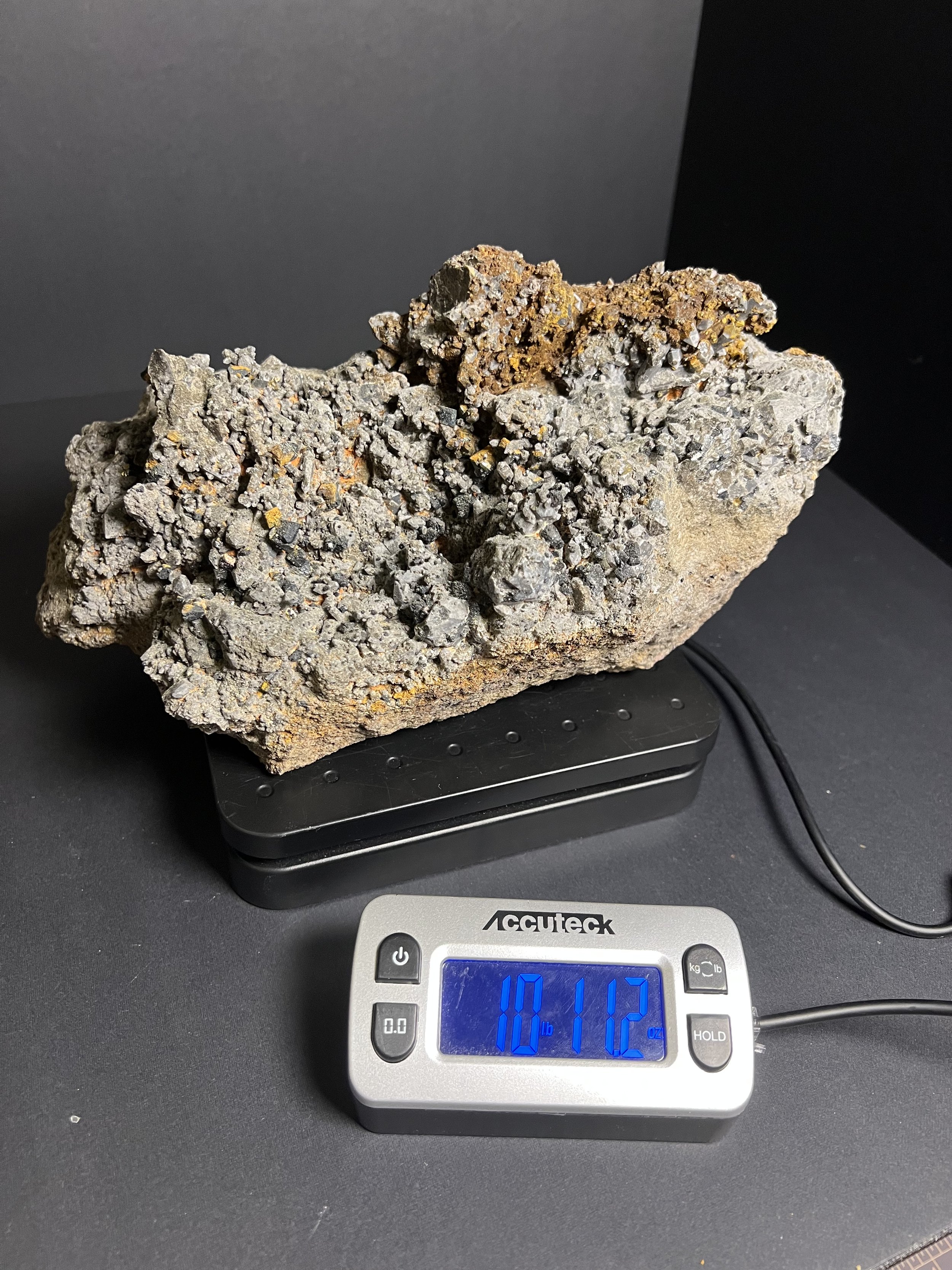 I actually almost left this piece behind when it was all covered in mud.  I thought there was no way all those little bumps could be crystal points or brookite.