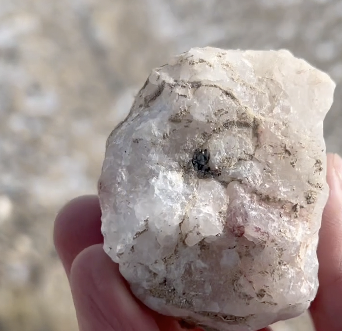 Here is the "amethyst" if you want to label it that.  Really, I think quartz with some impurities is a better way to describe it.
