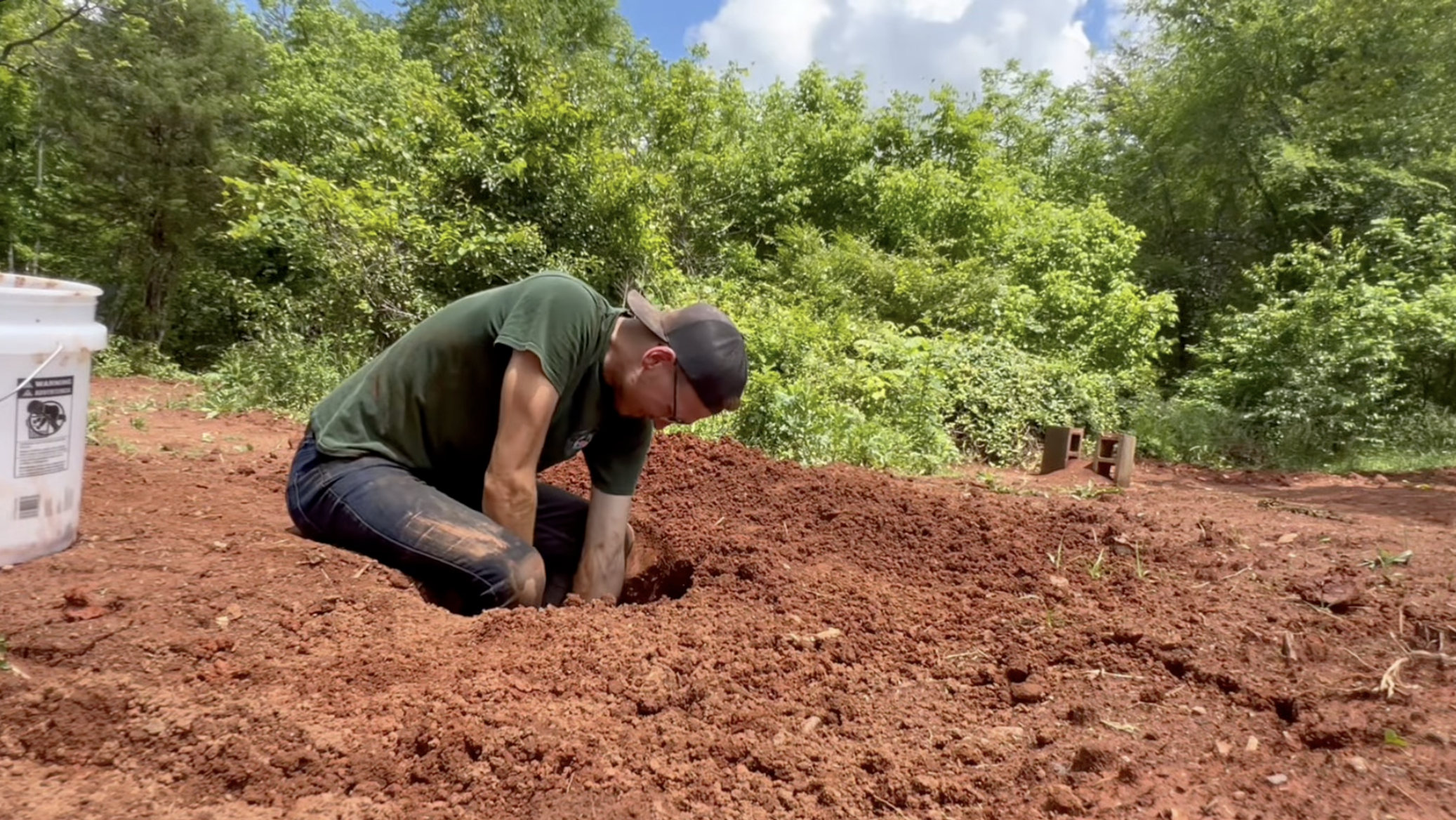 I found it most comfortable to sit on the edge and use the mini shovel to get to the clay at the bottom.