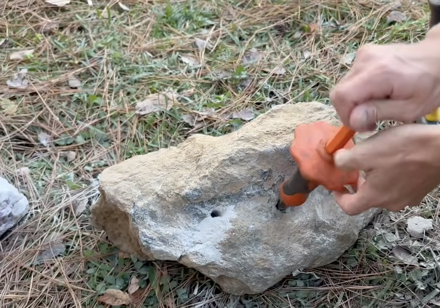 I used this old chisel to split apart a couple large boulders I brought home.  The holes were drilled using a rotary hammer.