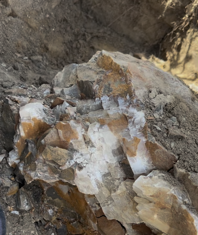 If you walk up to one, you'll see white or yellow calcite all over the place like this.