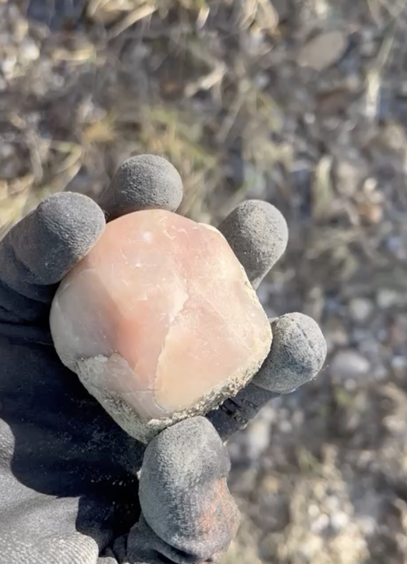 Another piece of rose quartz.  They've got a naturally smooth texture, which I assumed was a byproduct of being weathered around pretty heavily before ending up here.