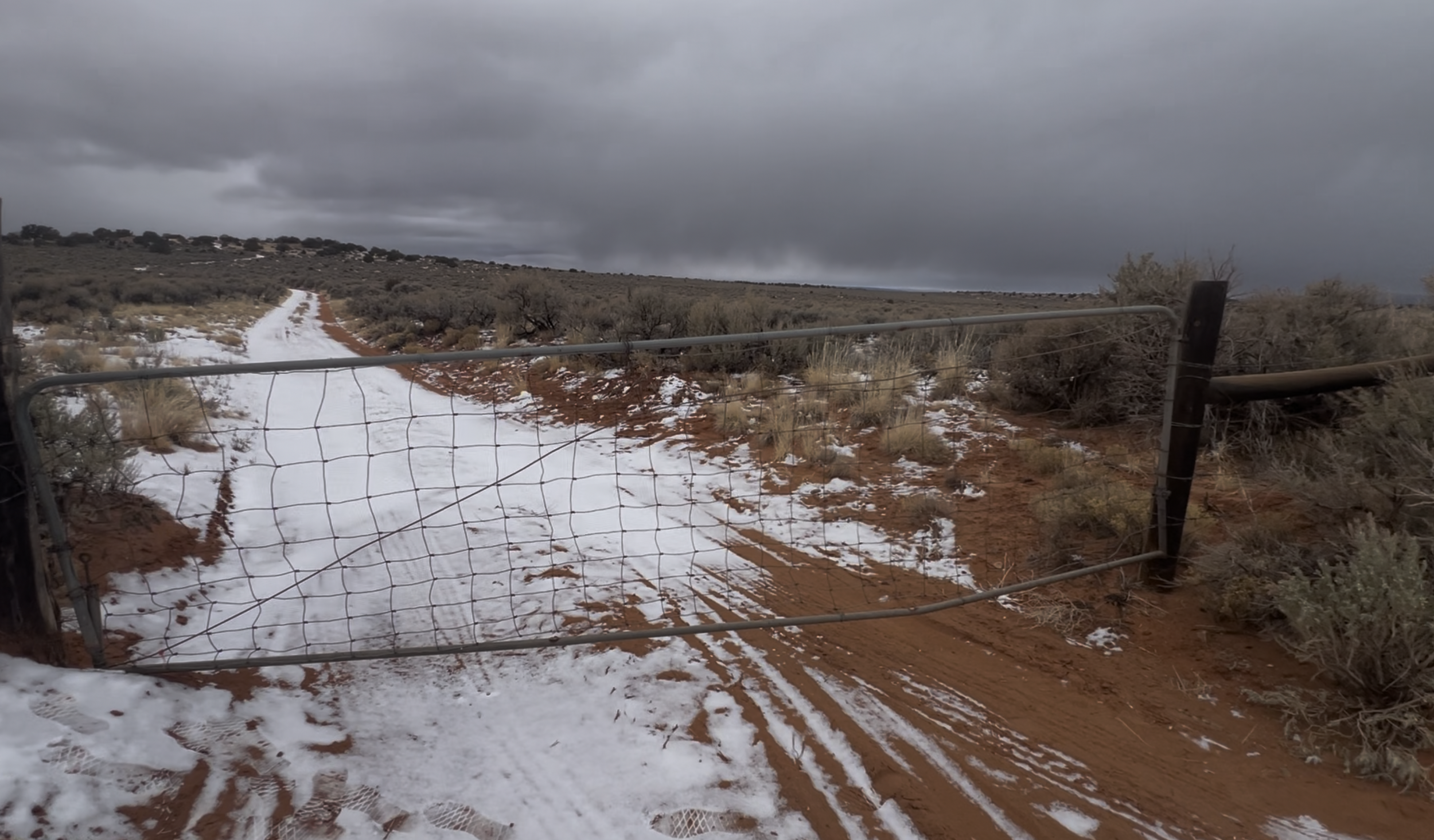 Heading South down Looking Glass Road, this is the gate you'll go through.  You will likely find it closed, but not locked.  It feels strange passing through if you haven't done it before, but this is common in public lands out West.  Just leave the 