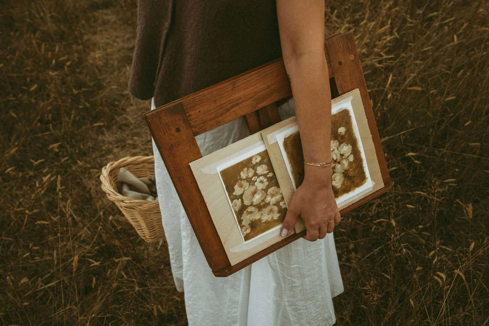 fromsundays-photoshoot-2025--holding-easel-and-basket-side-view.jpg