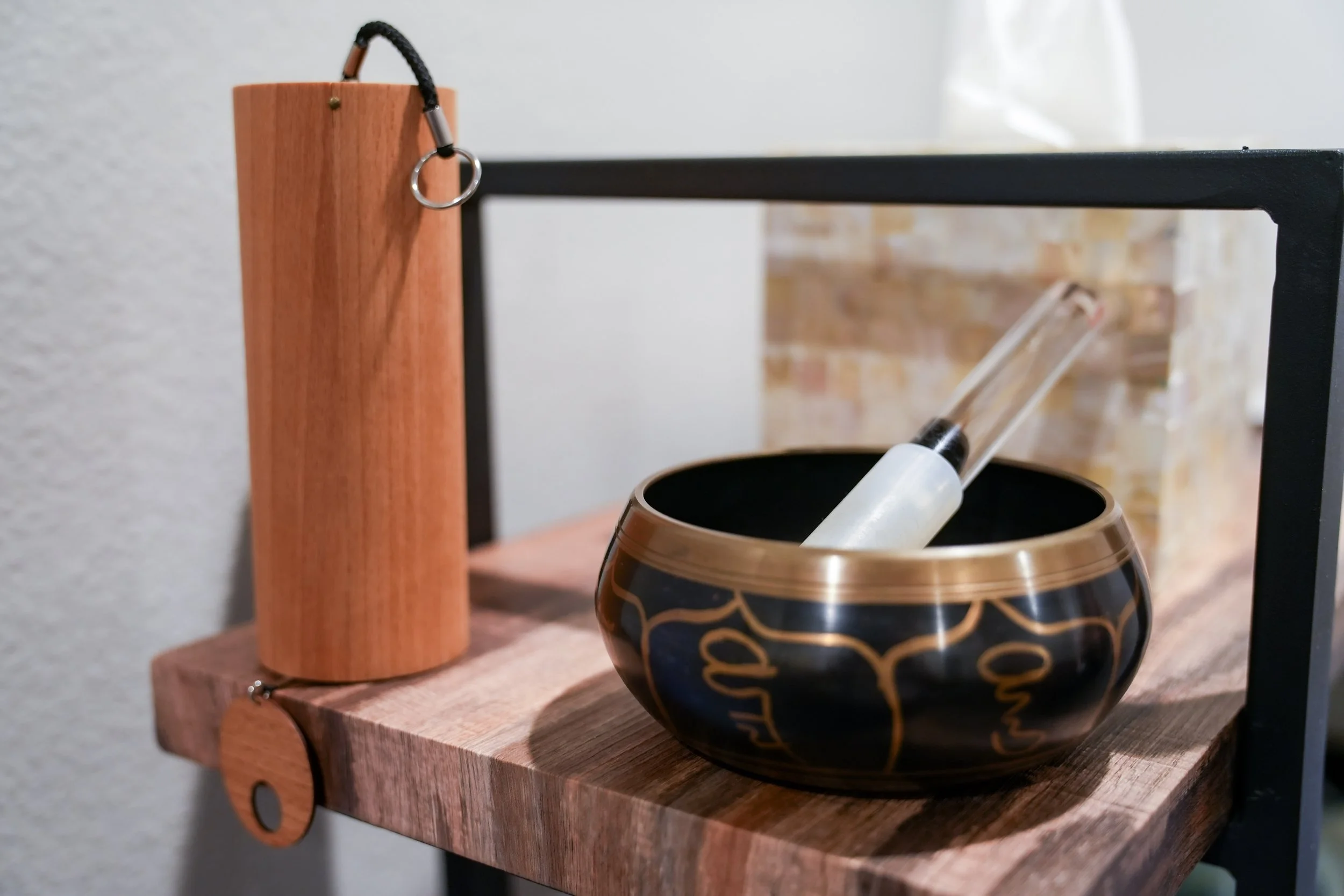 Chimes and a sound bowl in Mandala Method Healing studio.