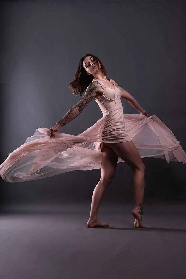 Boudoir portrait of woman in flowing dress during guided posing session by Shelly Erwich Photography serving Seattle, Bellevue, Renton and Kent areas