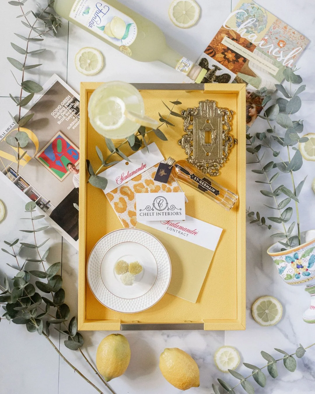 A flatlay like this one is really just a lesson in restraint dressed up as summer styling.

Lemons for colour. A woven tray to keep everything contained. Enough negative space that nothing feels crowded.

The instinct with entertaining is almost alwa