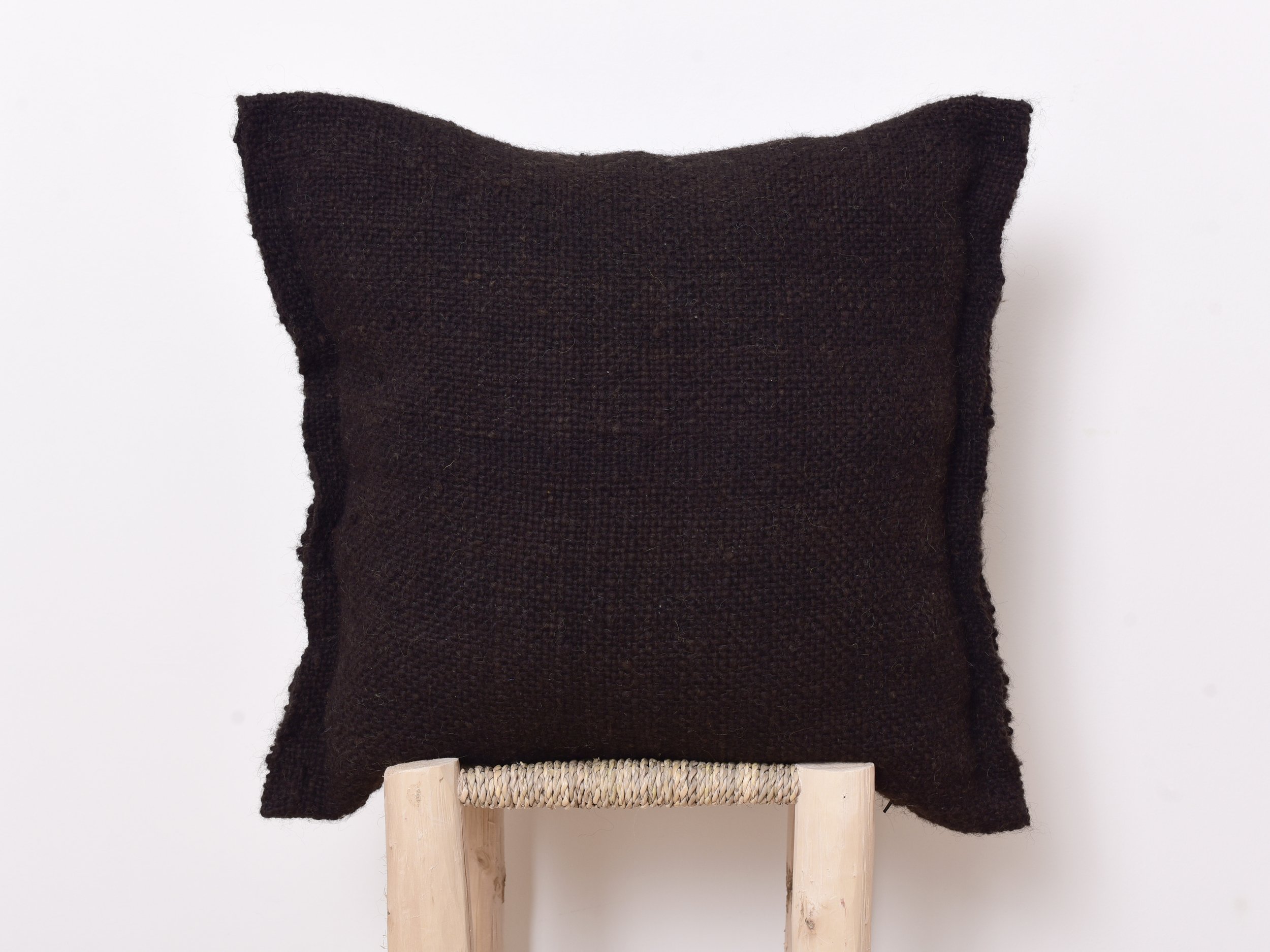 Moroccan handwoven eco-friendly, sustainable and toxic free wool pillow.