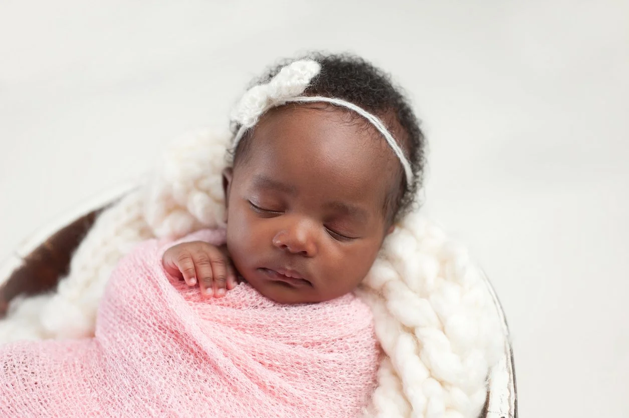 newborn baby girl sleeping