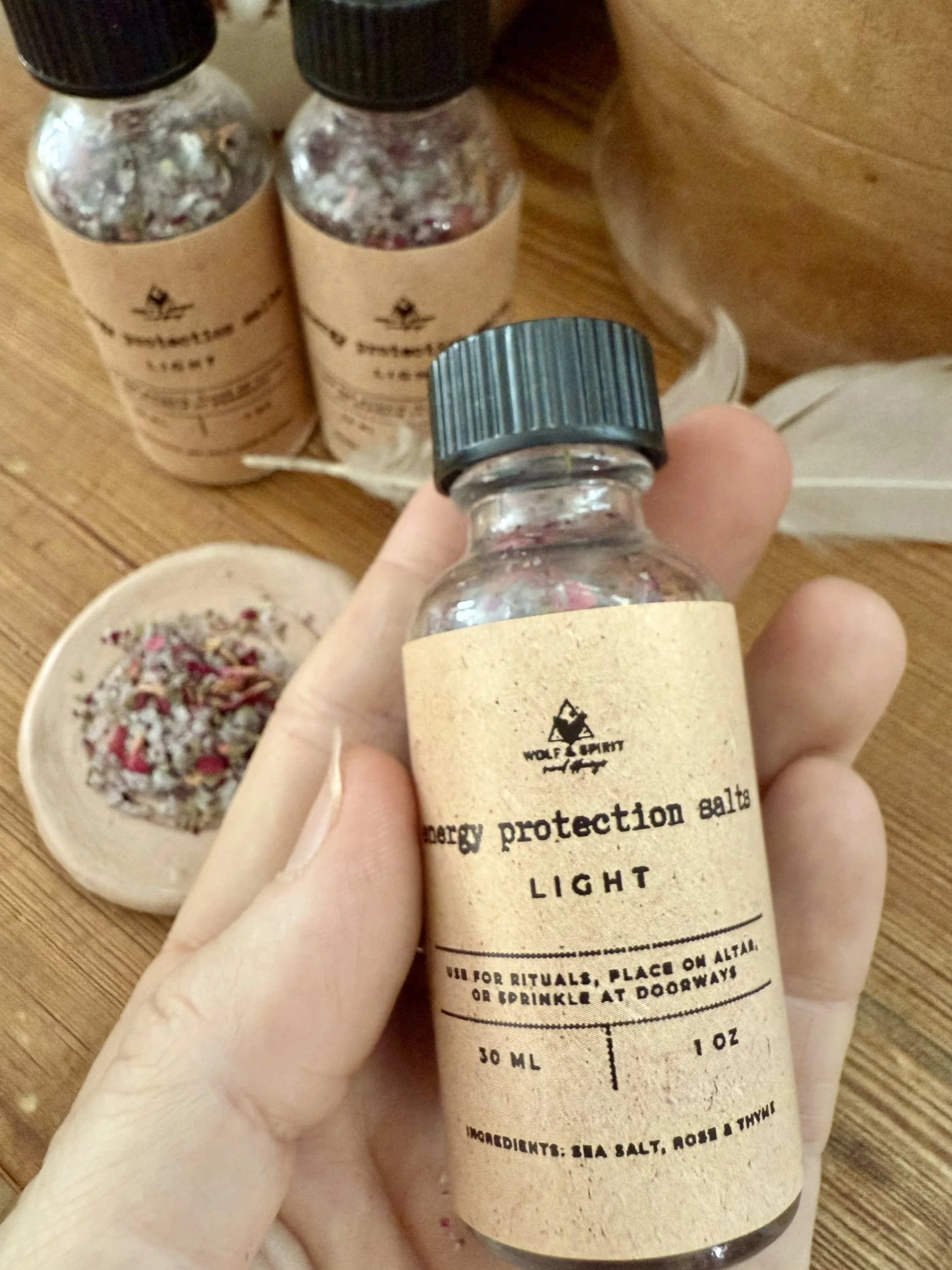 energy protection salts light with hand.jpg