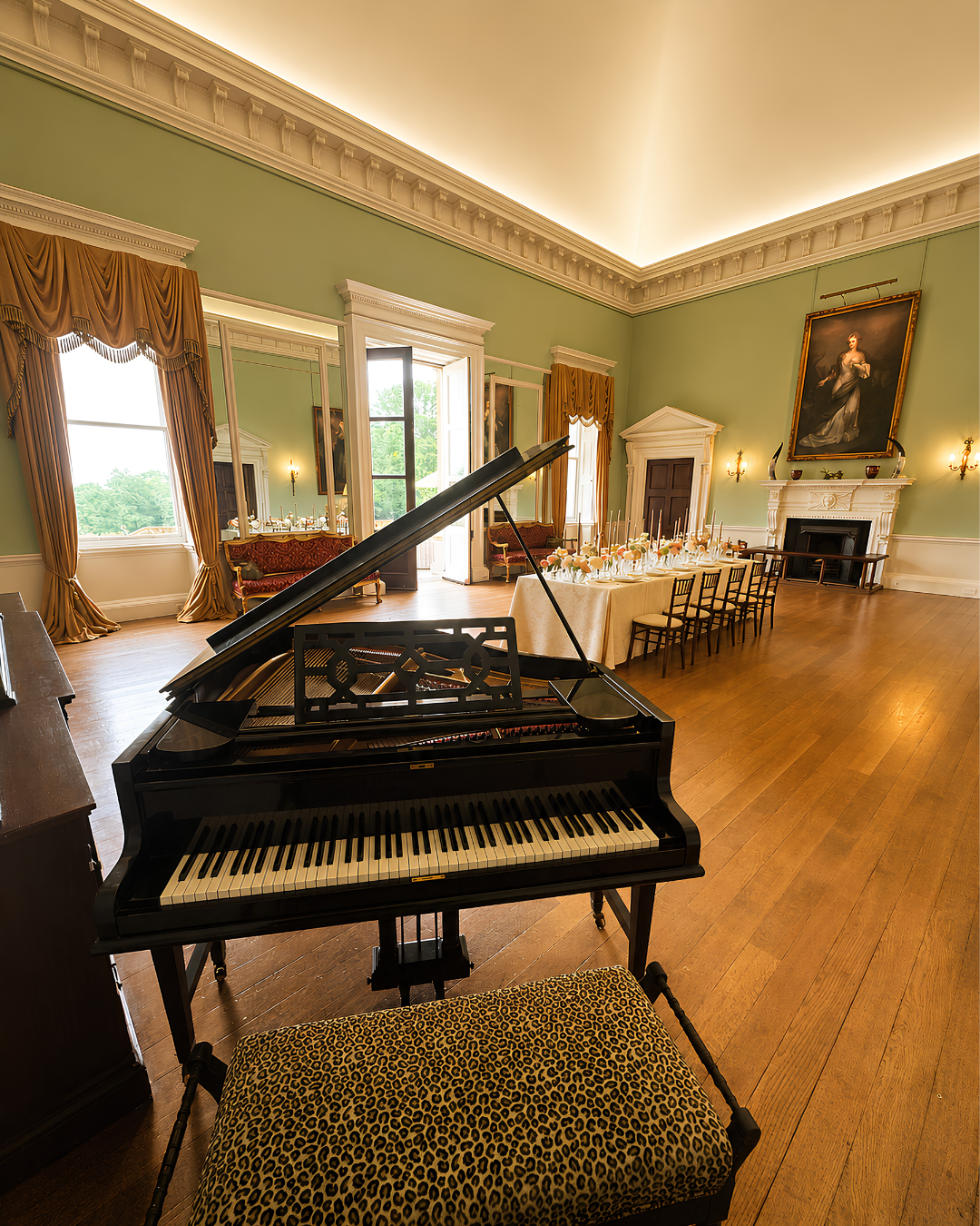 Live wedding pianist performing on a grand piano in an elegant period wedding venue – wedding music in Berkshire and Hampshire