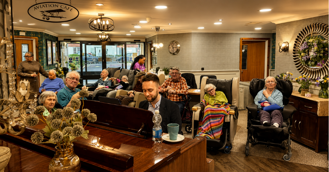 Lewis Bolland performing live piano music for residents at a care home lounge – dementia and Alzheimer's care home pianist in Berkshire and Hampshire