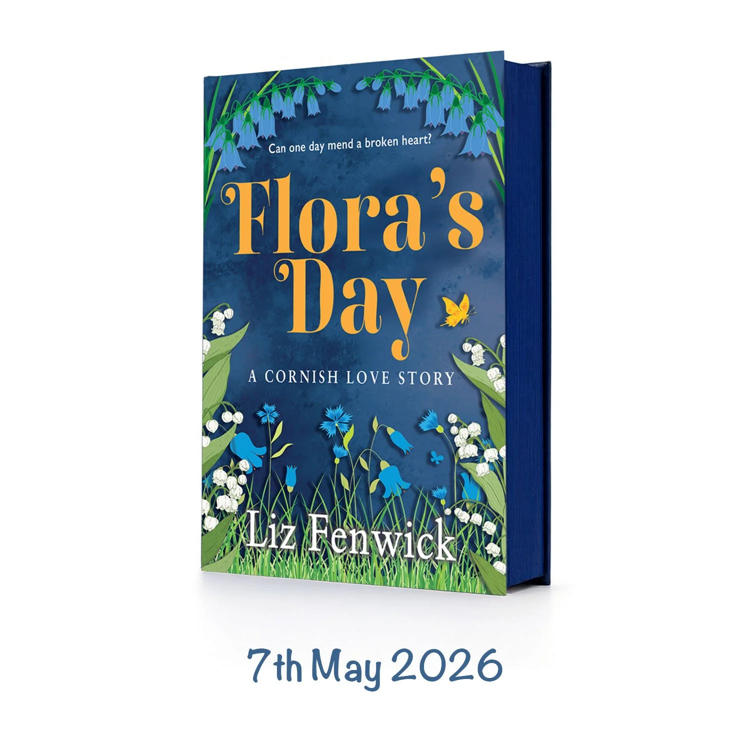 A hardcover book titled 'Flora's Day: A Cornish Love Story' by Liz Fenwick, with a blue cover decorated with flowers, butterflies, and grass. The publication date '7th May 2026' is beneath the book.