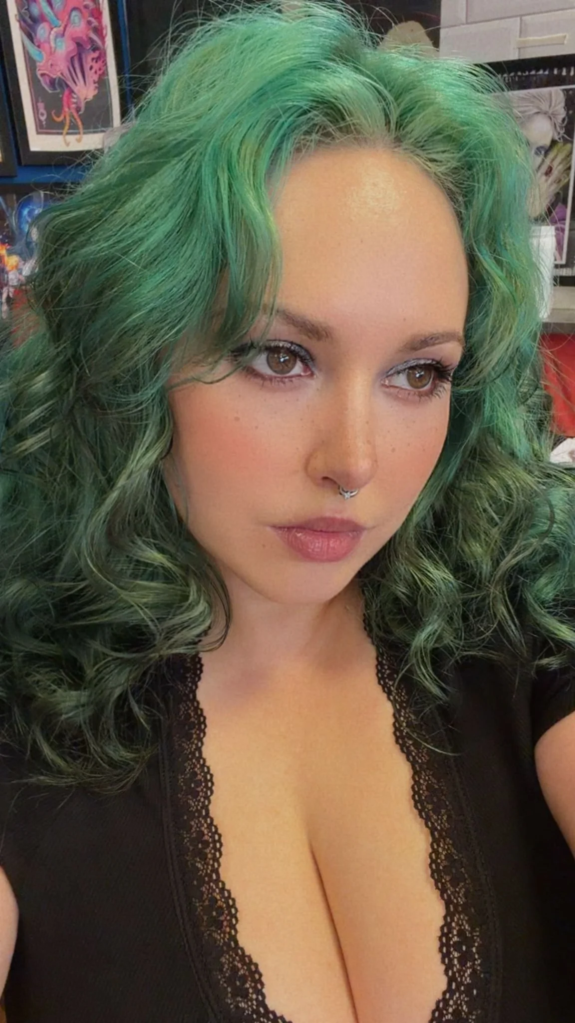 Tattoo artist girls with long green hair proficient in illustrative and ornamental designs in Luton
