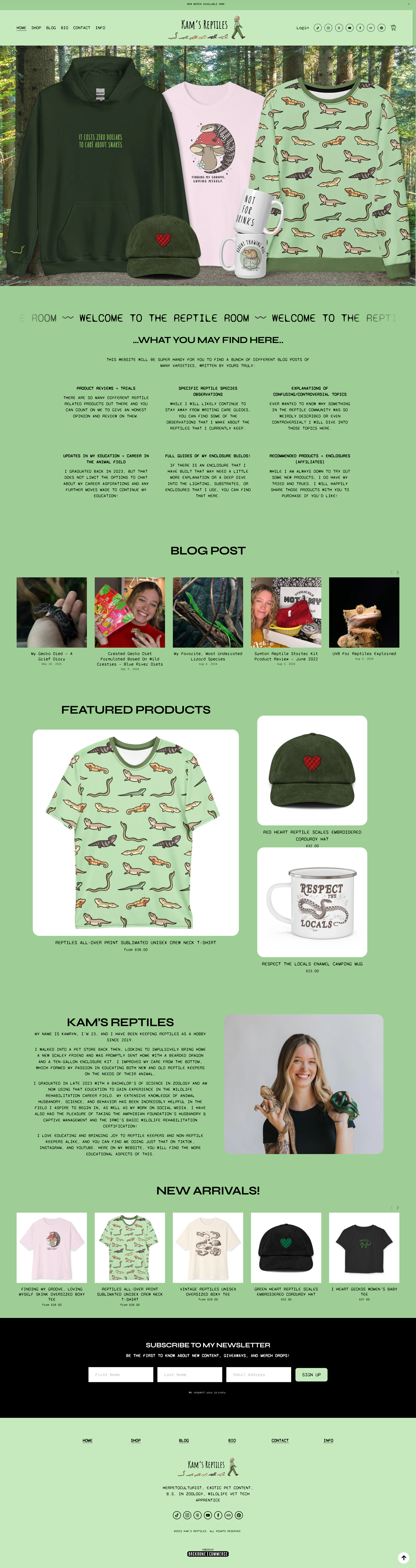 Screenshot of Kam's Reptiles website homepage featuring reptile-themed clothing and accessories, including T-shirts with reptile patterns, a cap with a heart, and a mug with a reptile illustration, set against a forest background.