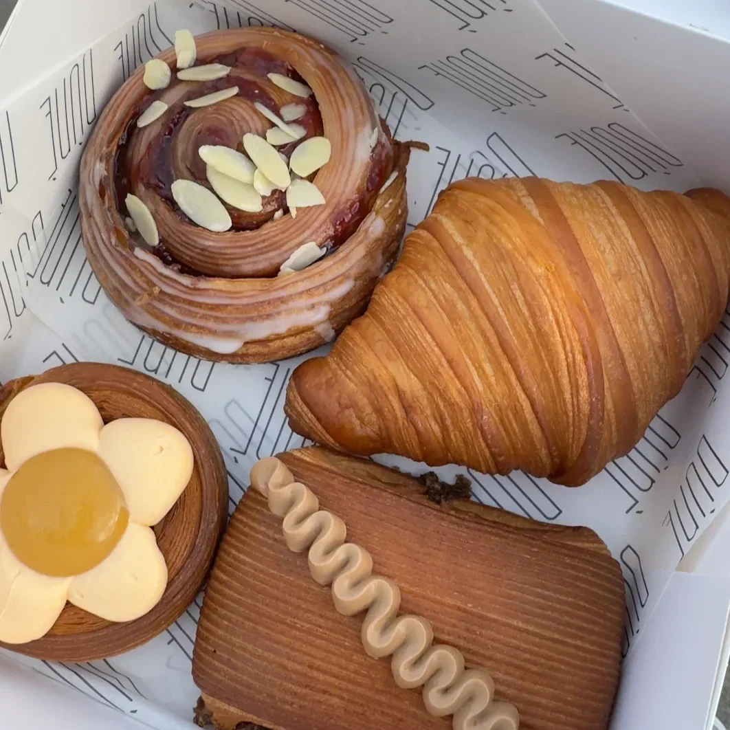 four pastries in a box