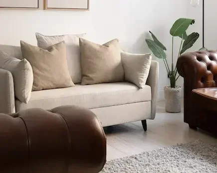 a close up of a living space at oxford circus apartments