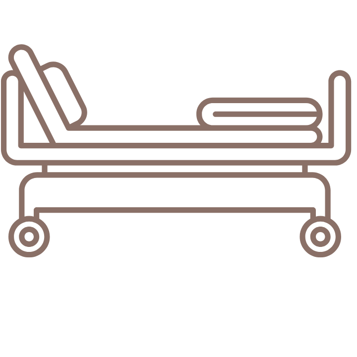 Hospital gurney with side rails, headboard, and wheels