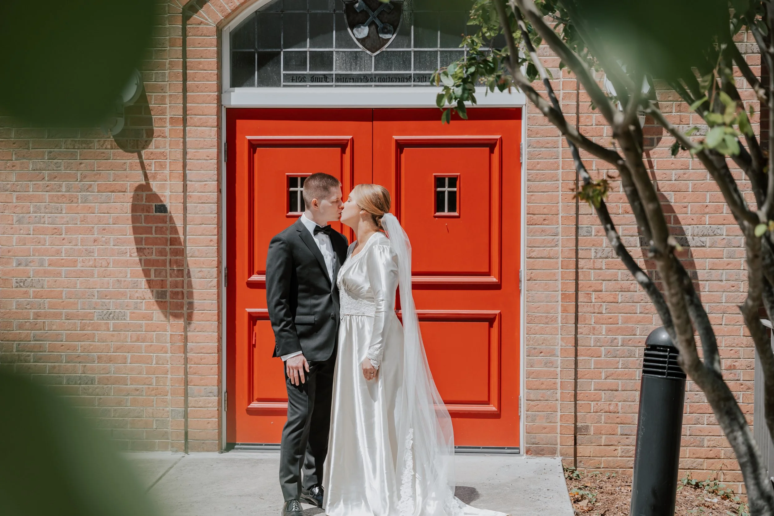 A teacher kneeling on the floor with 4-6 year old children exploring stories during Godly Play Sunday School class at Saint Peter's Episcopal Church in Arlington, VA.