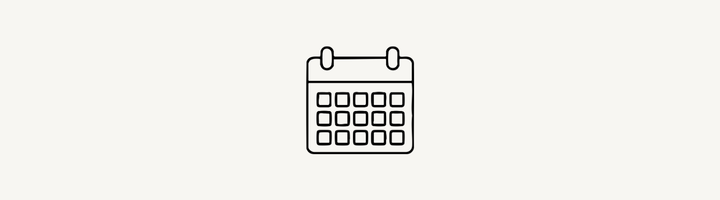 A simple black and white illustration of a calendar.