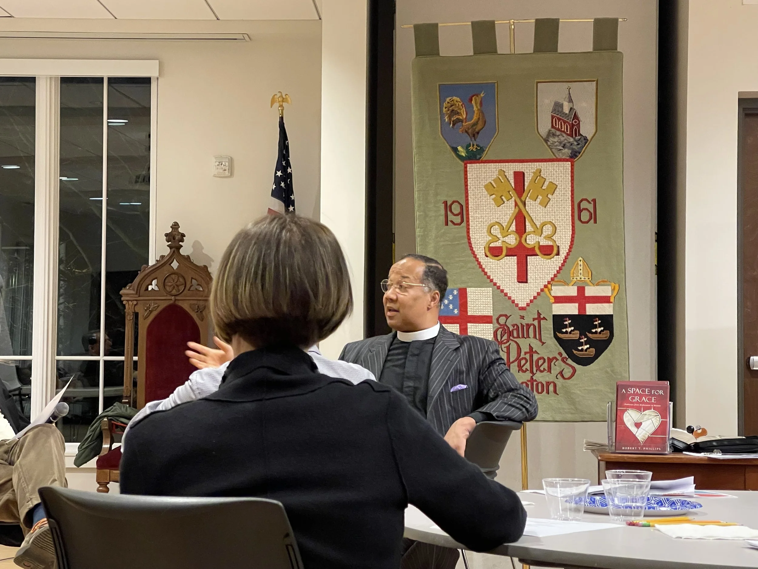 A man speaking to a group