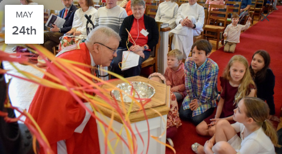 Bishop Gulick giving a homily to children