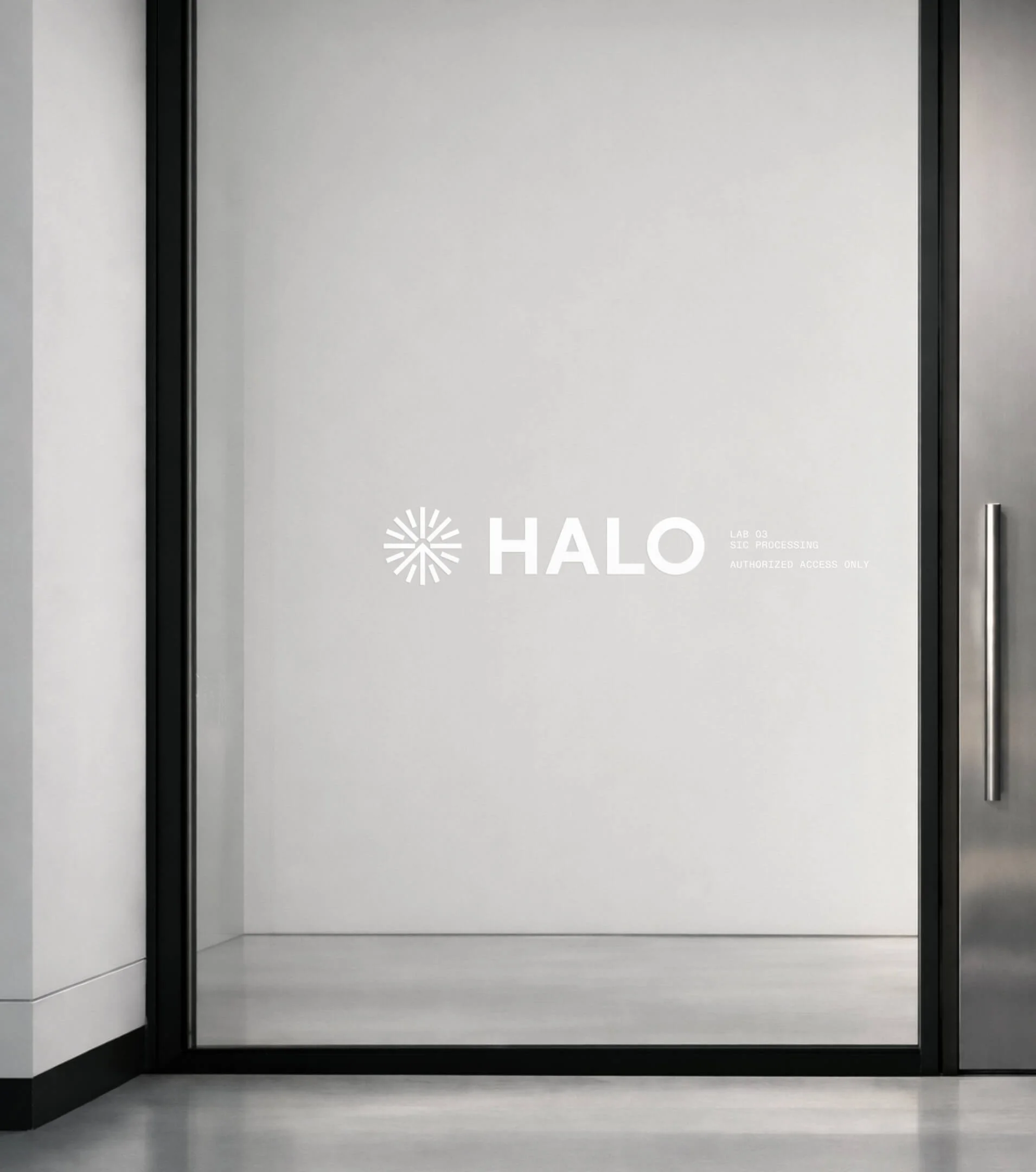 Glass door with the word 'HALO' and a logo, indicating authorized access to a lab or processing room.