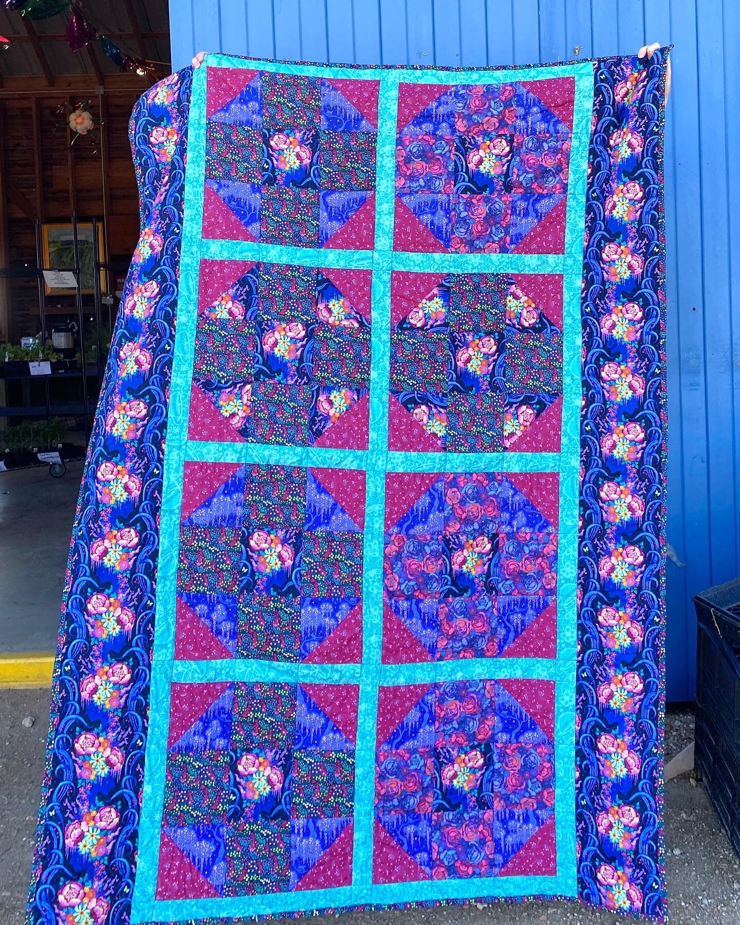 A quilt I made for my daughter using my Belle &Eacute;poque fabric from FreeSpirit! We took this photo in Texas Hill Country against this beautiful blue barn near Blanco, Texas. I didn&rsquo;t use a pattern but just kinda made it up as I went. Luckil