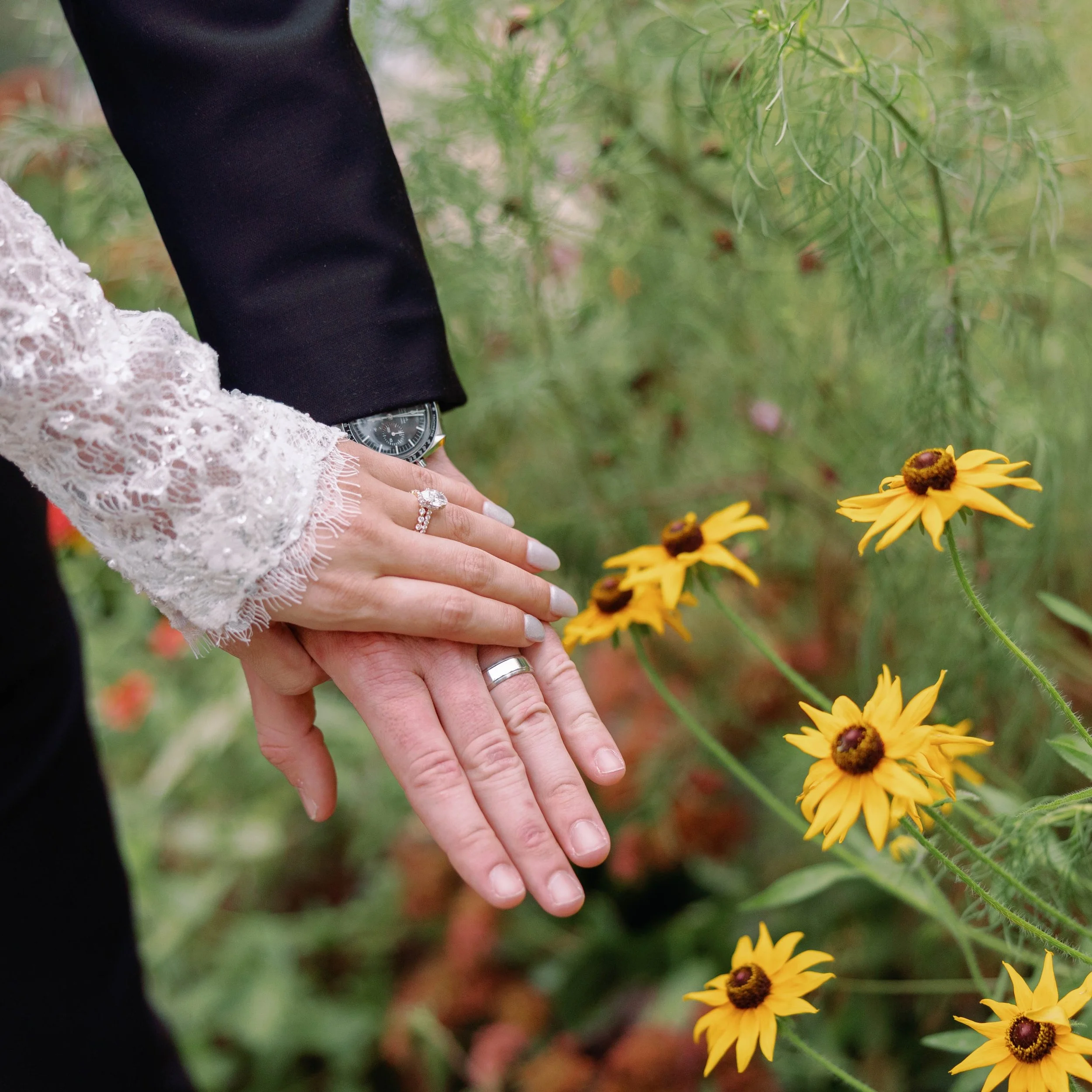 Wedding rings + yellow flowers