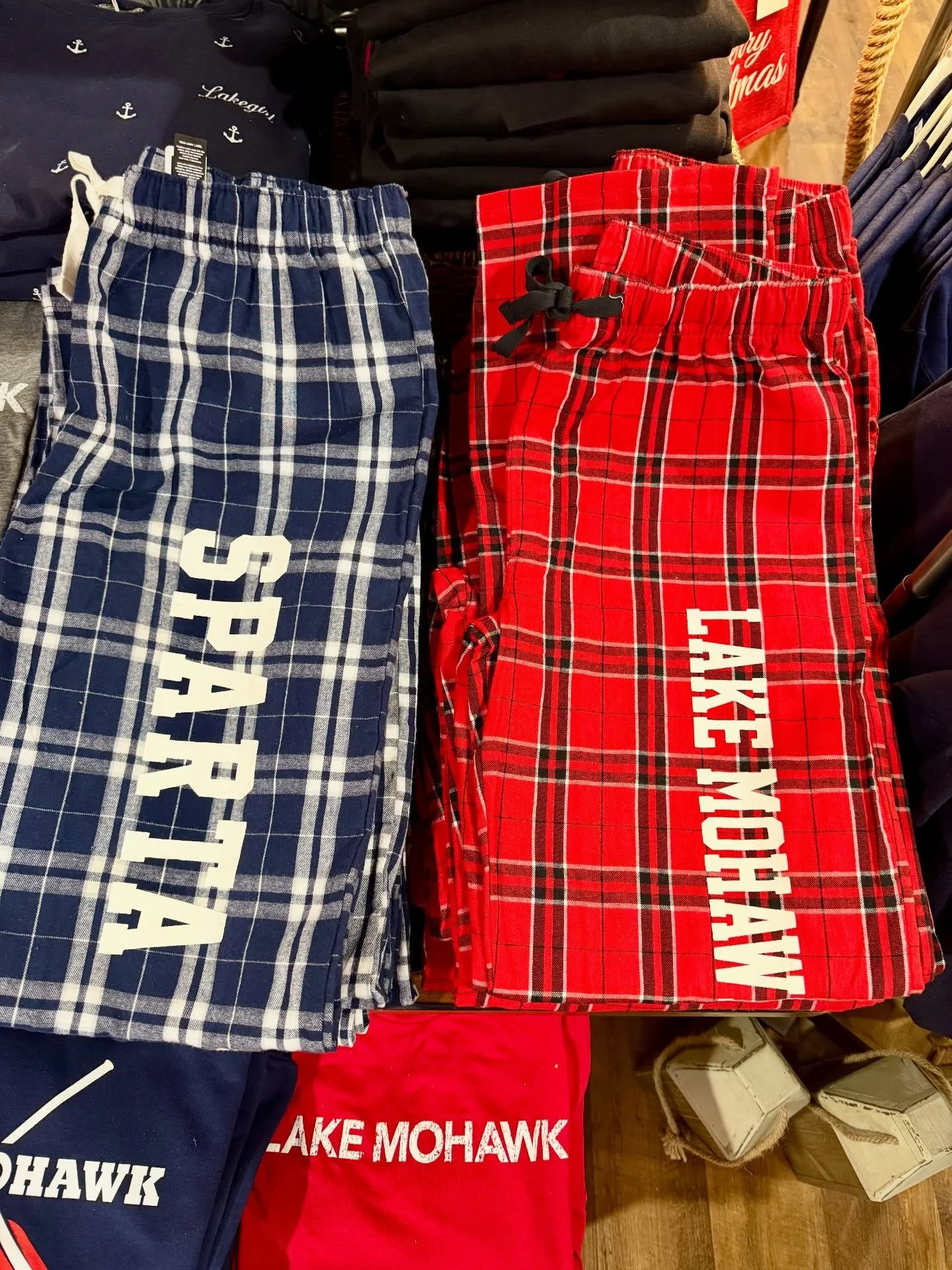 BACK BY POPULAR DEMAND!!

Town pride has never felt so cozy! Our Lake Mohawk and Sparta flannels are finally back in stock. Limited supply, stop in and stock up today!!