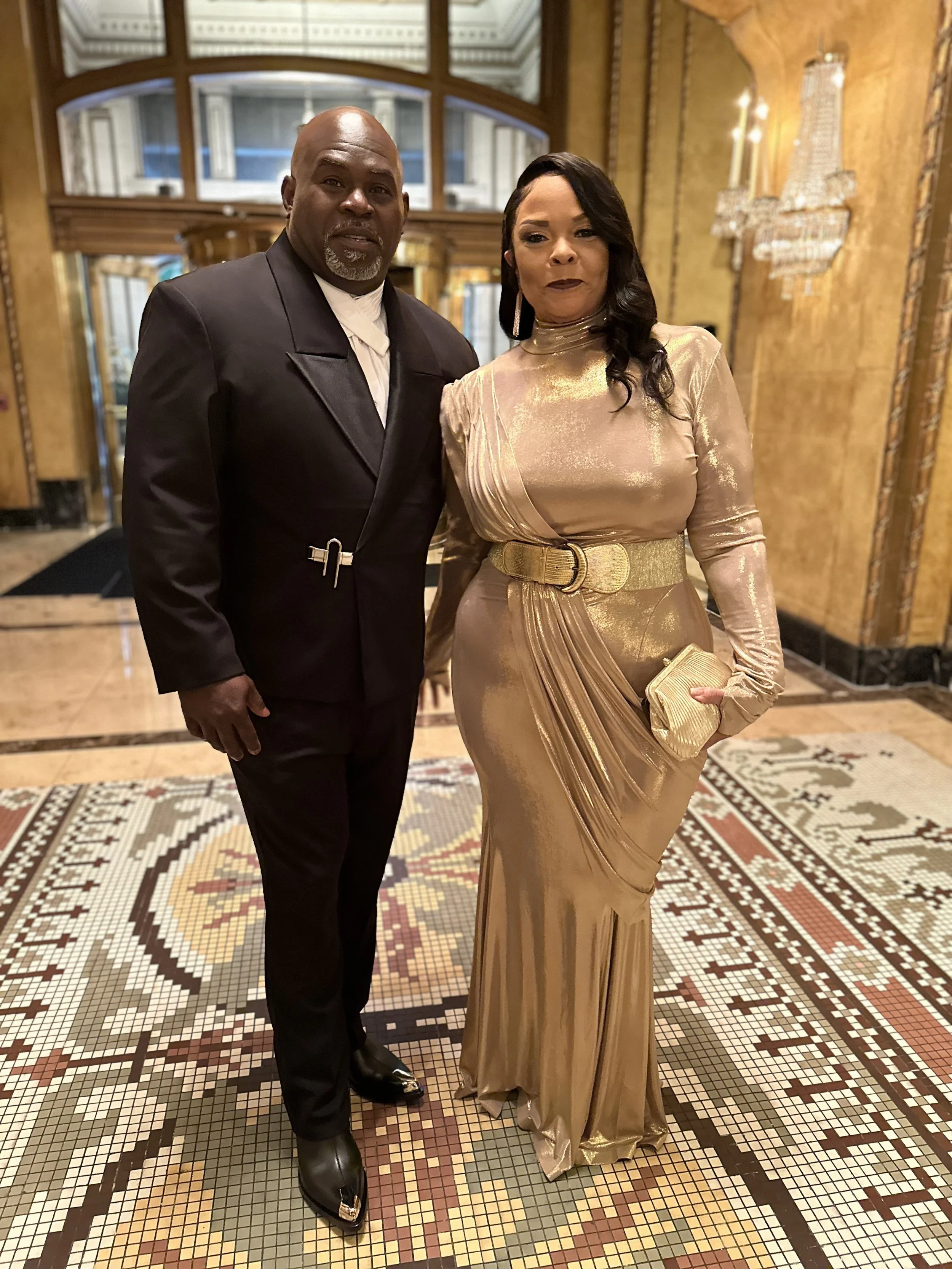 David and Tamela Mann for the Urban Honors '24//David : Suit: Customized Beeombi/ Shoes : McQueen//Tamela/ Dress: Norma Kamali 