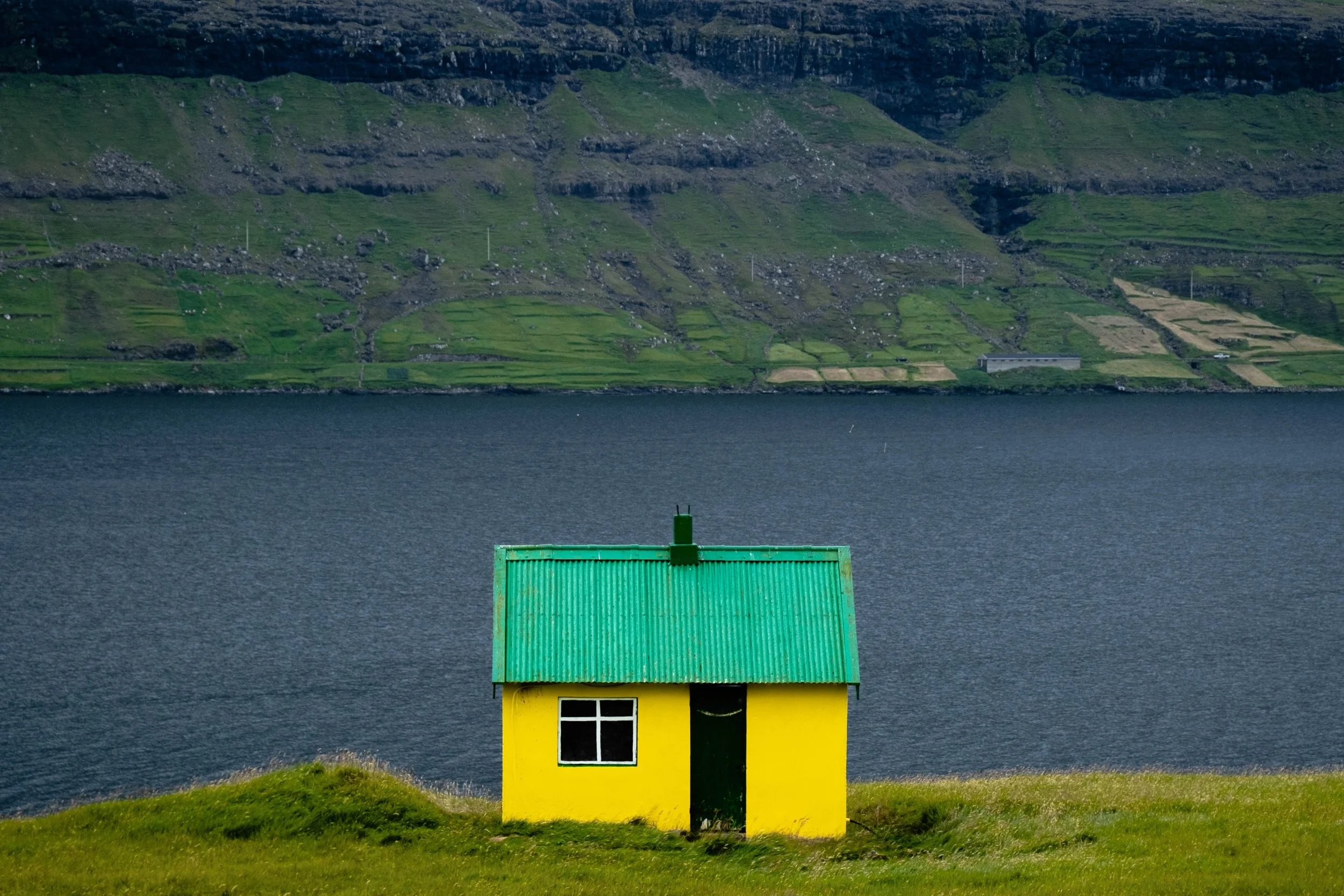 Vivid colored house in the archipelago of the Faroe Islands.